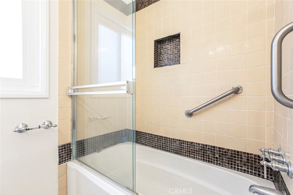 10347 Newhome Avenue Sunland, CA 91040 - Photo 16 of 33 a bathroom with a bathtub