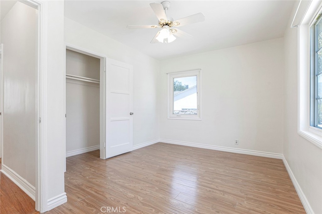 10347 Newhome Avenue Sunland, CA 91040 - Photo 17 of 33 wooden floor in an empty room with a window