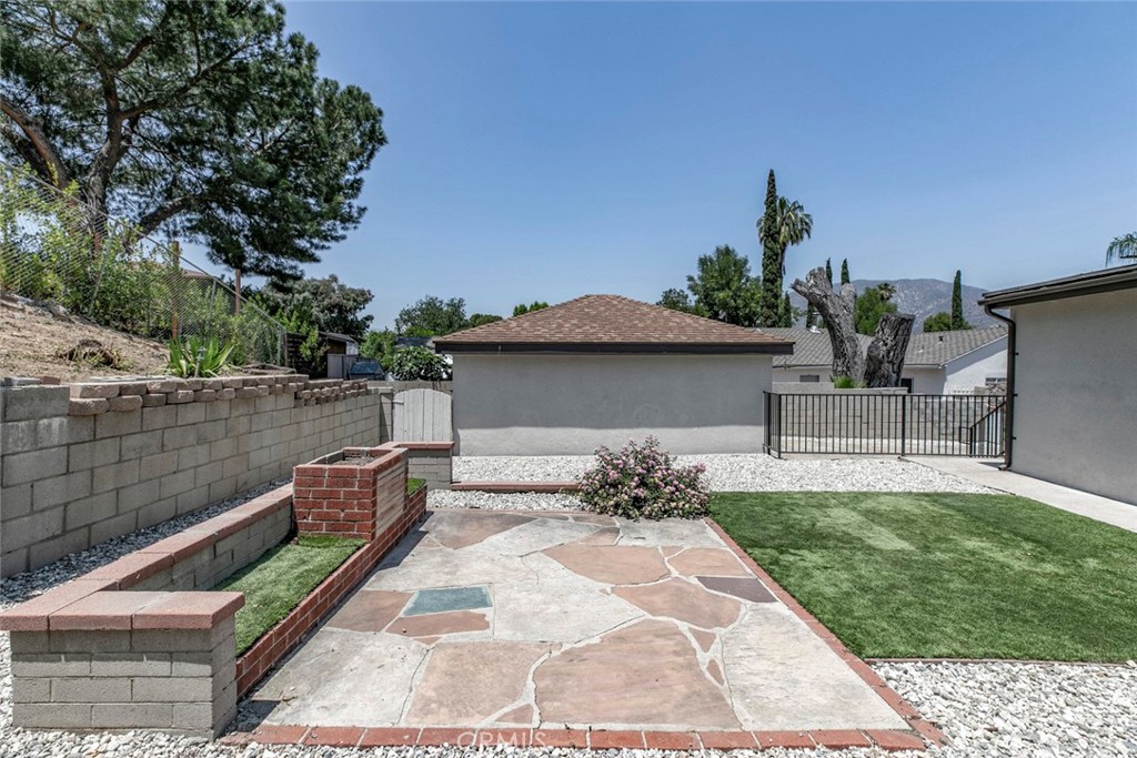 10347 Newhome Avenue Sunland, CA 91040 - Photo 26 of 33 a view of a backyard with sitting area