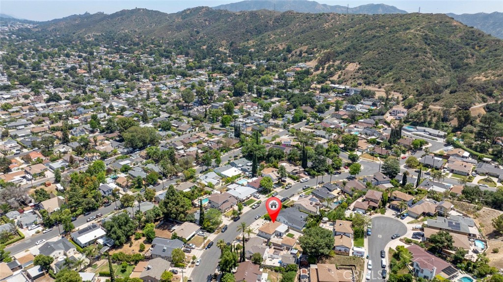 10347 Newhome Avenue Sunland, CA 91040 - Photo 31 of 33 an aerial view of a houses with a lush green hillside