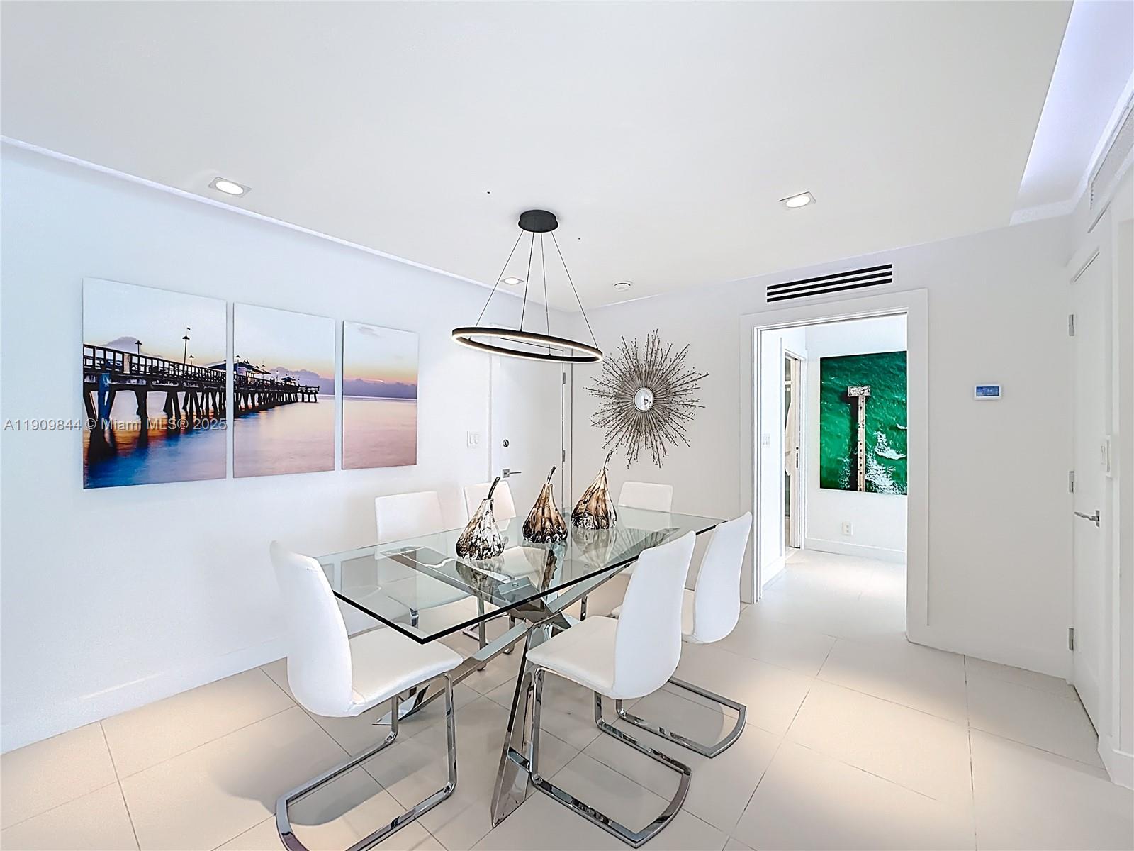 2715 North Ocean Boulevard, Unit 15D Fort Lauderdale, FL 33308 - Photo 11 of 57 a dining room with furniture and window