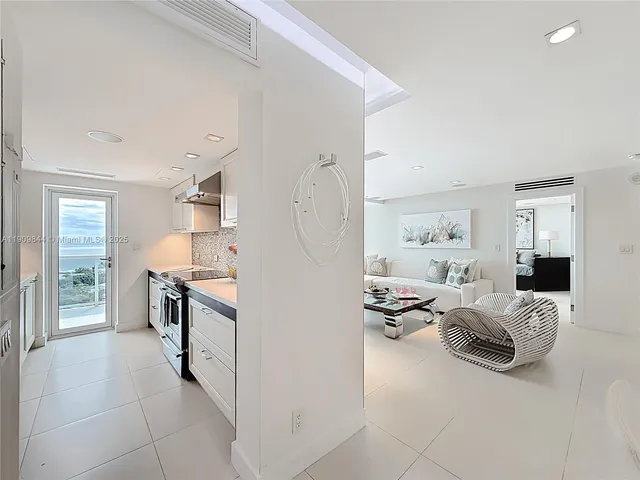 a bedroom with furniture and a flat screen tv