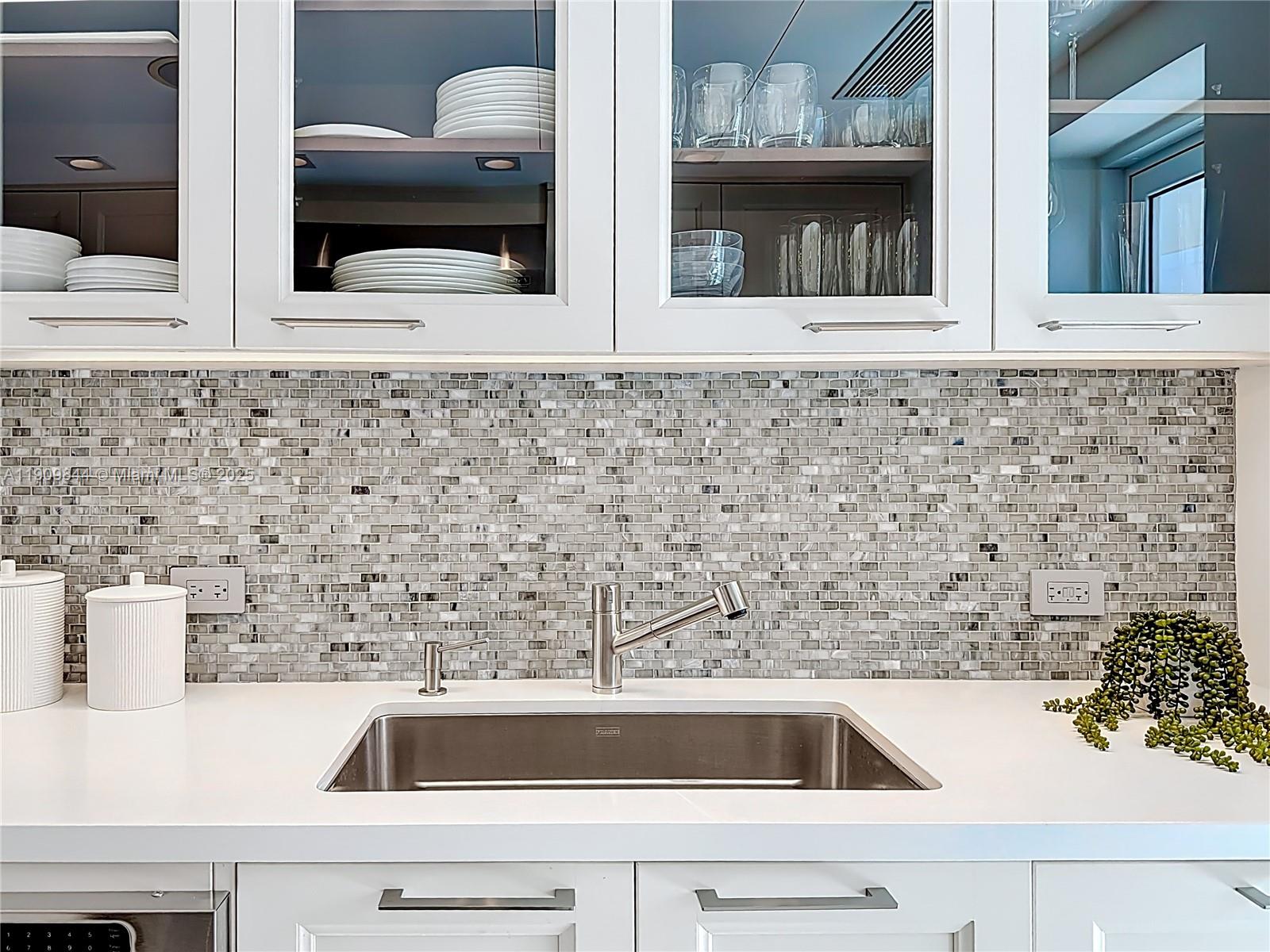 2715 North Ocean Boulevard, Unit 15D Fort Lauderdale, FL 33308 - Photo 18 of 57 a bathroom with a sink and a mirror