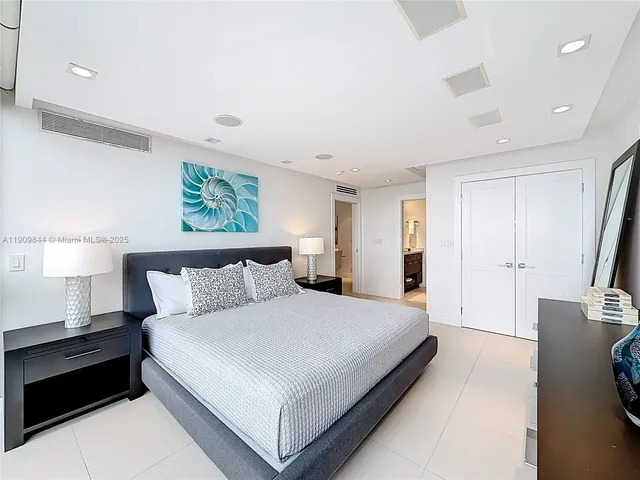 a bathroom with a sink double vanity and a mirror