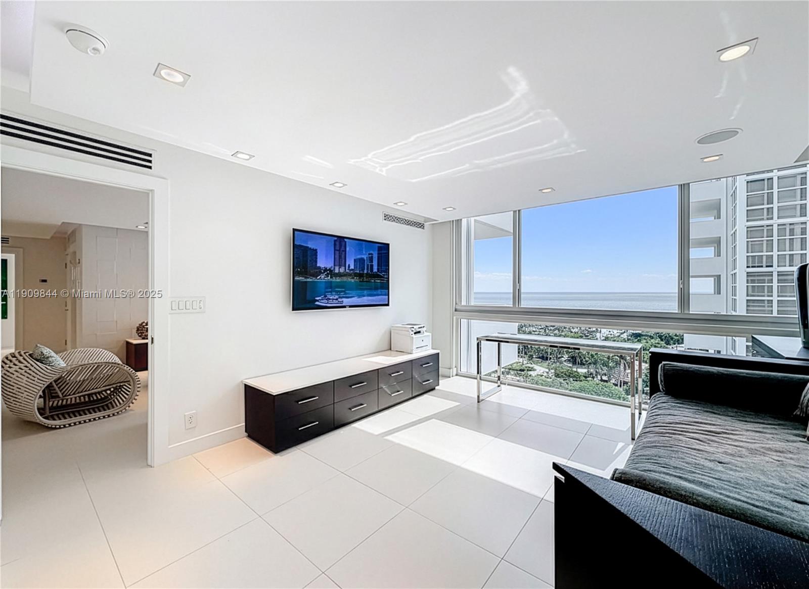 2715 North Ocean Boulevard, Unit 15D Fort Lauderdale, FL 33308 - Photo 30 of 57 a large white kitchen with a large window