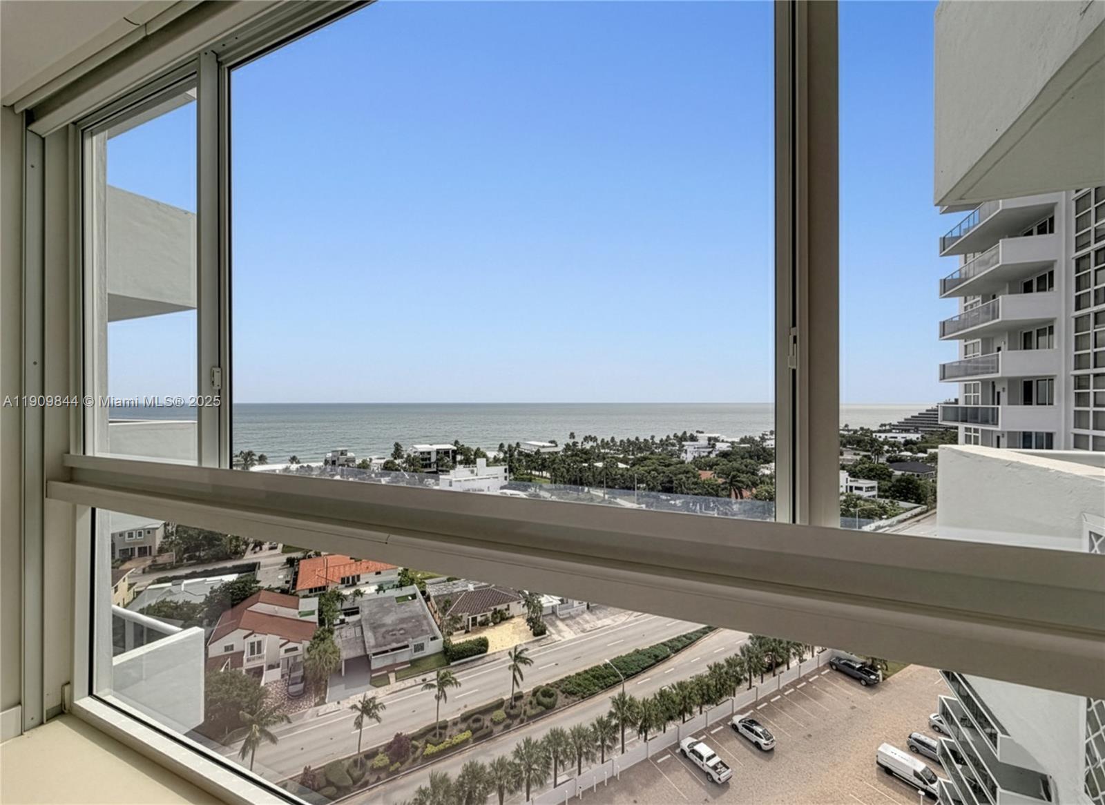 2715 North Ocean Boulevard, Unit 15D Fort Lauderdale, FL 33308 - Photo 35 of 57 a view of a living room and a floor to ceiling window or couch