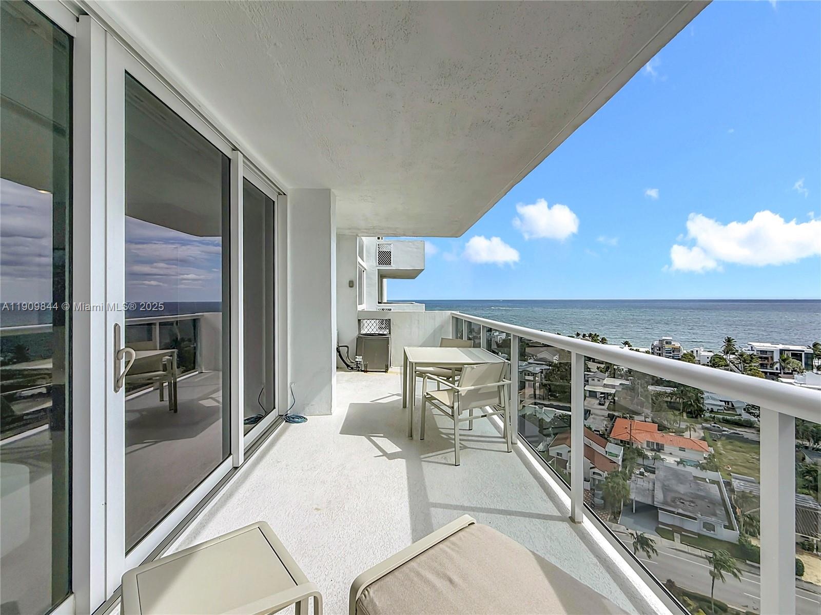 2715 North Ocean Boulevard, Unit 15D Fort Lauderdale, FL 33308 - Photo 42 of 57 a view of a balcony dining table and chairs