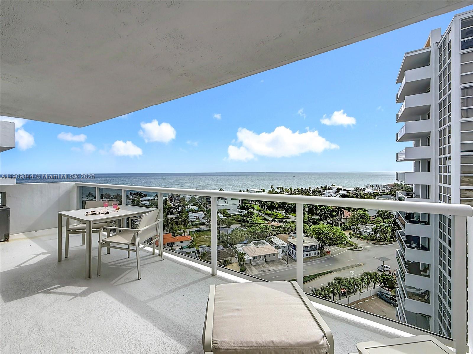 2715 North Ocean Boulevard, Unit 15D Fort Lauderdale, FL 33308 - Photo 43 of 57 a view of a patio with a table and chairs