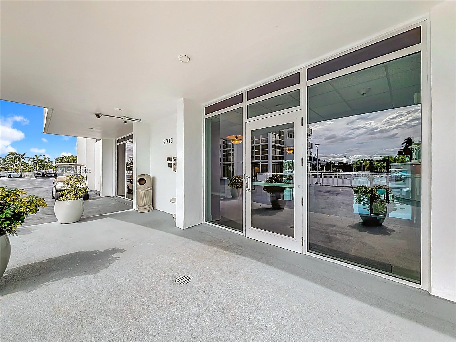 2715 North Ocean Boulevard, Unit 15D Fort Lauderdale, FL 33308 - Photo 48 of 57 a view of a living room and a porch