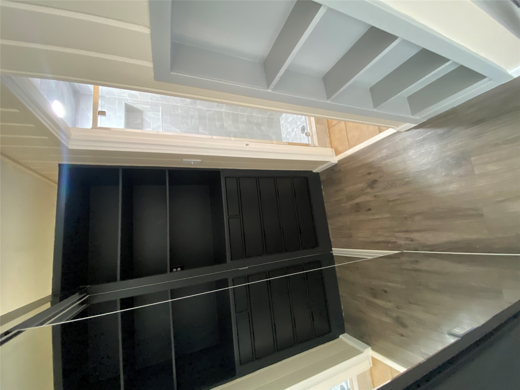 3010 Fruth Street, Unit B Austin, TX 78705 - Photo 14 of 32 Ample built-in shelving offers smart storage solutions in this inviting closet space.