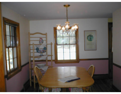 16 Eaton Road Framingham, MA 01701 - Photo 9 of 10 a view of a dining room with furniture and window