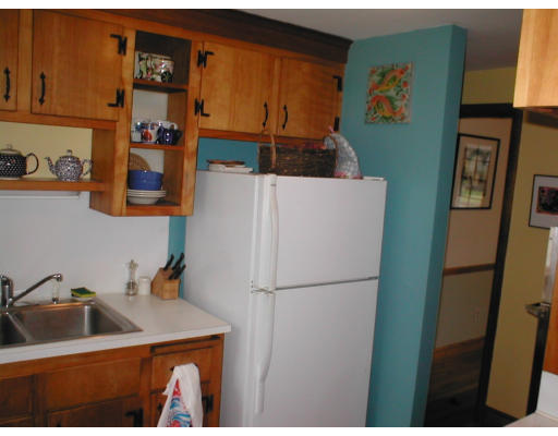 16 Eaton Road Framingham, MA 01701 - Photo 10 of 10 a kitchen with a refrigerator and a sink