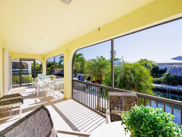 a kitchen with cabinets a sink and appliances