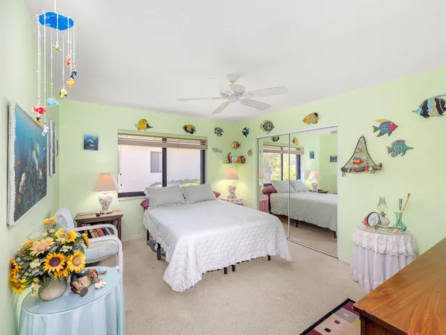 a living room with furniture a wooden floor and a window