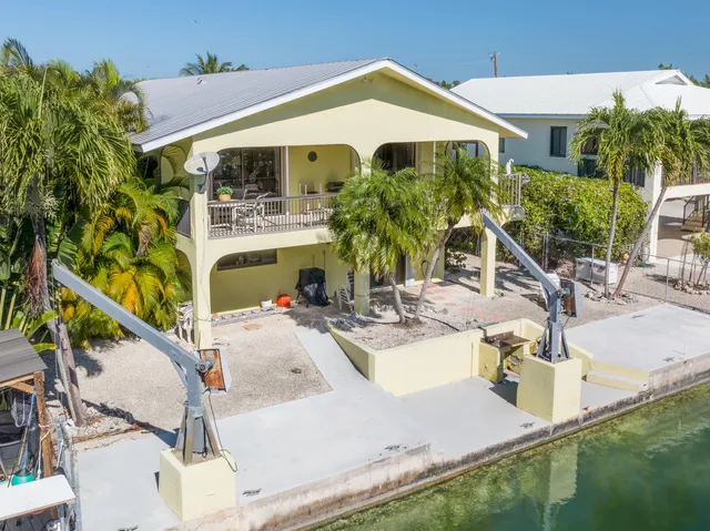 a view of a building with swimming pool