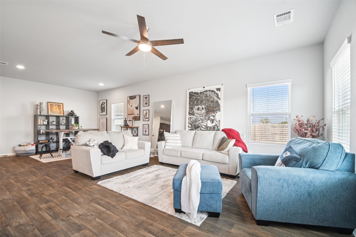 5525 Sacra Cove Austin, TX 78747 - Photo 3 of 20 a living room with furniture and white walls