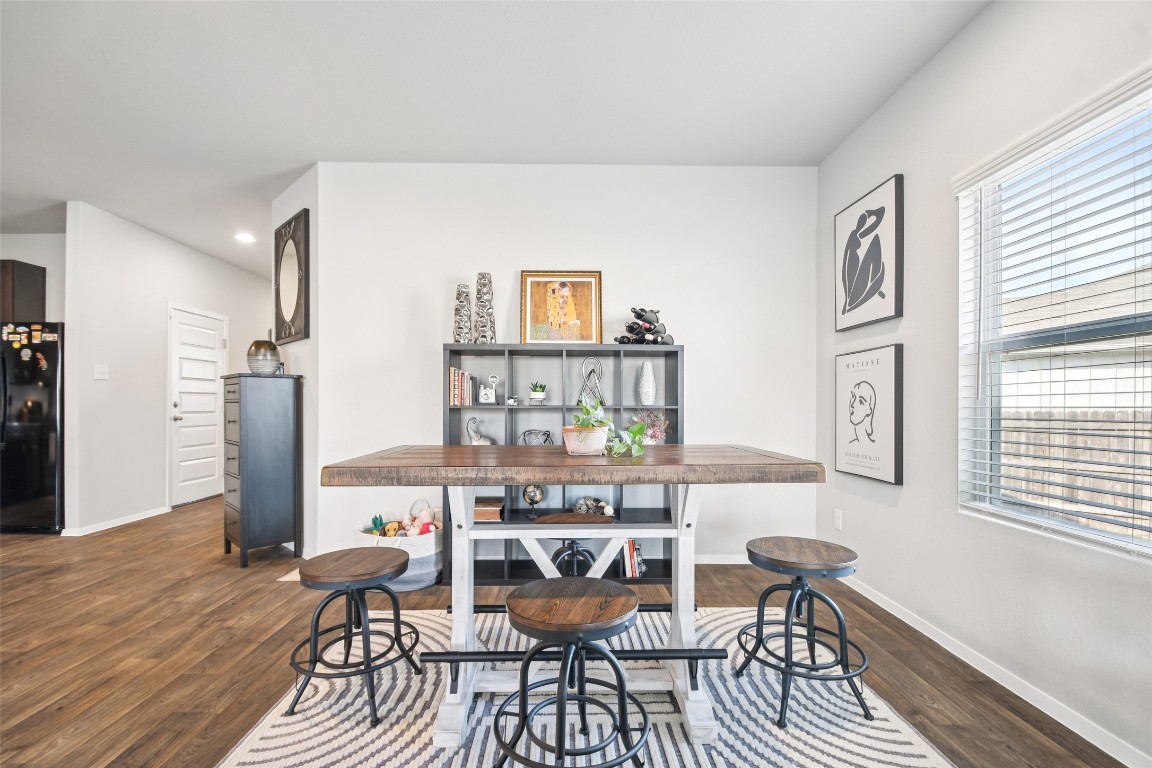 5525 Sacra Cove Austin, TX 78747 - Photo 4 of 20 a dining room with furniture and window