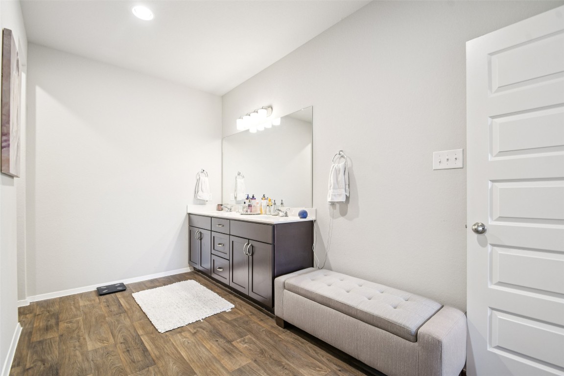 5525 Sacra Cove Austin, TX 78747 - Photo 10 of 20 a room with a bed and furniture