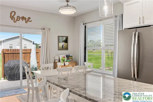 a view of kitchen with living room