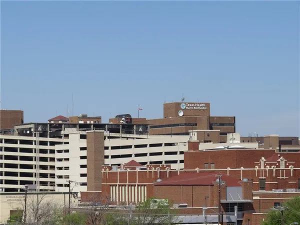 a view of a large building with a city view