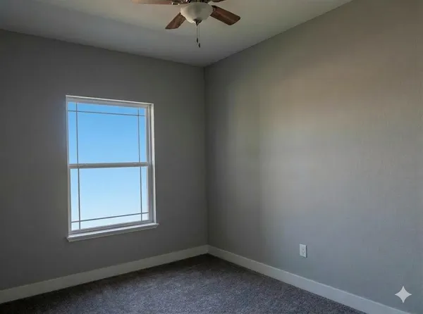 an empty room with a window