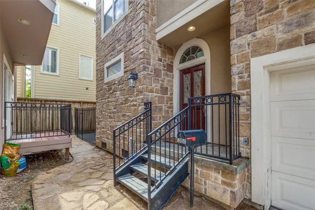 a view of a balcony with furniture
