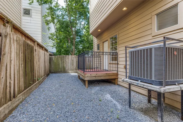 a view of a backyard with sitting area