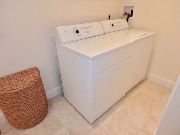5 Laurel Avenue Oak Bluffs, MA 02557 - Photo 18 of 25 a utility room with dryer and washer