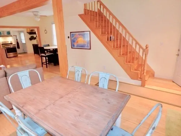 a view of livingroom and dining room with furniture