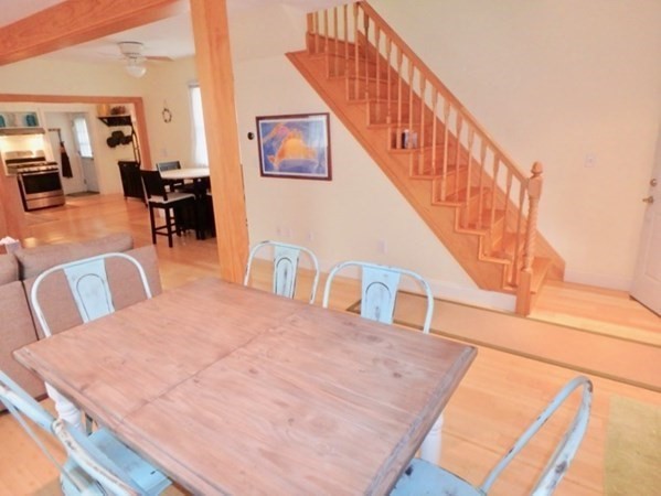 5 Laurel Avenue Oak Bluffs, MA 02557 - Photo 5 of 25 a view of livingroom and dining room with furniture