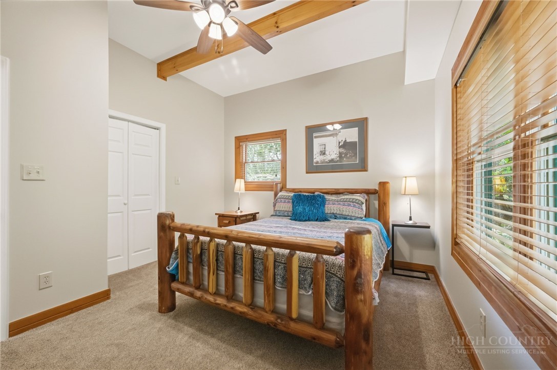 850 River Ridge Road Boone, NC 28607 - Photo 13 of 26 a bed room with a bed and a window