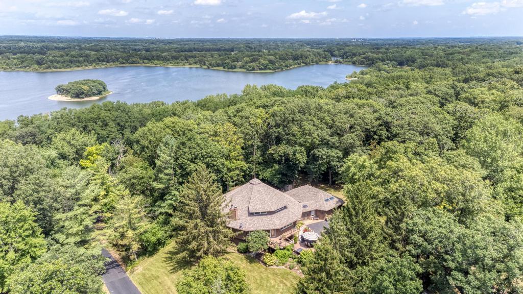 3205 West Southmor Road Morris, IL 60450 - Photo 1 of 74 a view of a lake with a mountain in the background