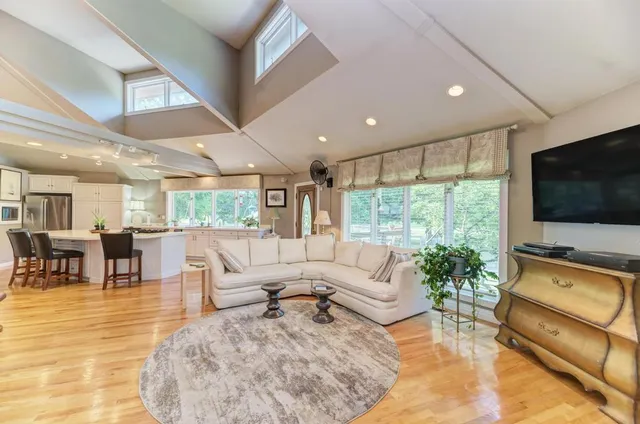 a kitchen with a table and chairs in it