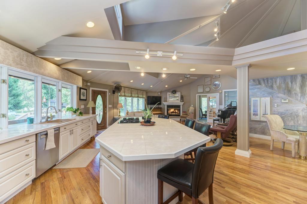 3205 West Southmor Road Morris, IL 60450 - Photo 24 of 74 a large kitchen with kitchen island a dining table and chairs