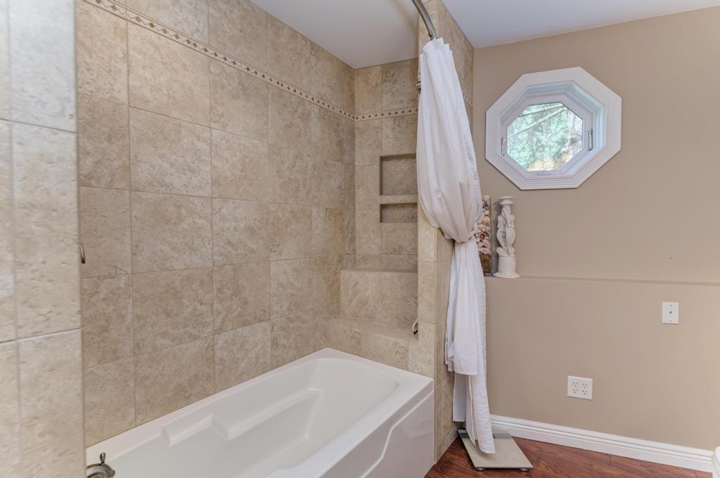 3205 West Southmor Road Morris, IL 60450 - Photo 50 of 74 a bathroom with a bathtub and a shower