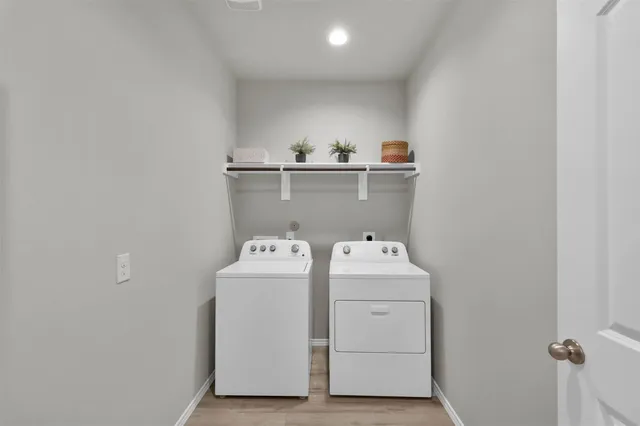 a utility room with dryer and washer