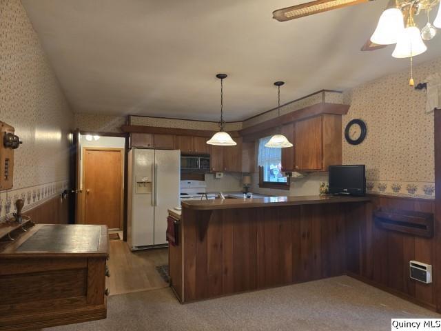 707 Country Lane Carthage, IL 62321 - Photo 2 of 26 a kitchen with stainless steel appliances granite countertop a sink a counter space and a refrigerator