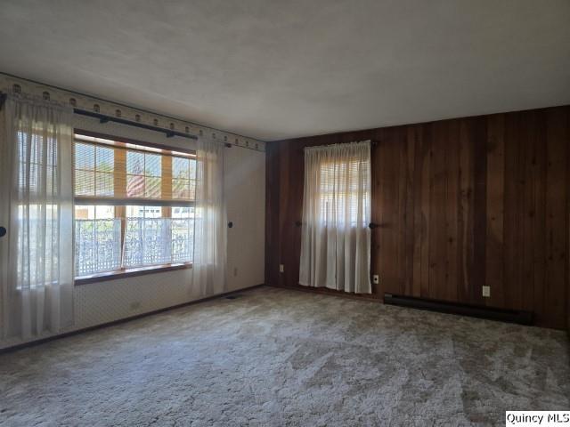 707 Country Lane Carthage, IL 62321 - Photo 9 of 26 an empty room with windows