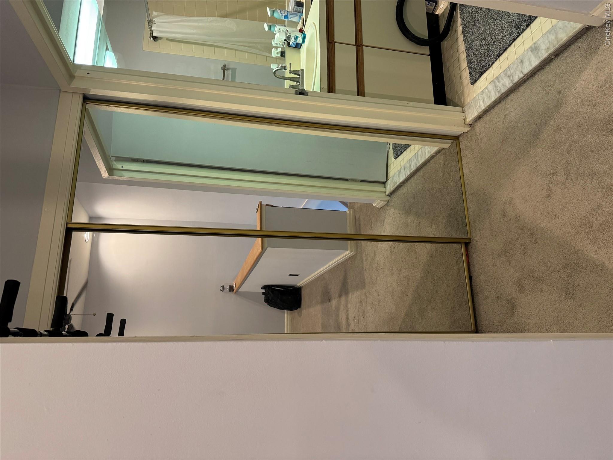 1701 Crompond Road, Unit 6313 Peekskill, NY 10566 - Photo 9 of 13 a bathroom with a tub and a mirror