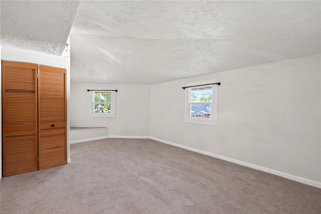 2684 Arthur Road Springfield, OH 45502 - Photo 37 of 69 This versatile room offers bright windows and plush carpeting, perfect for flexible living.