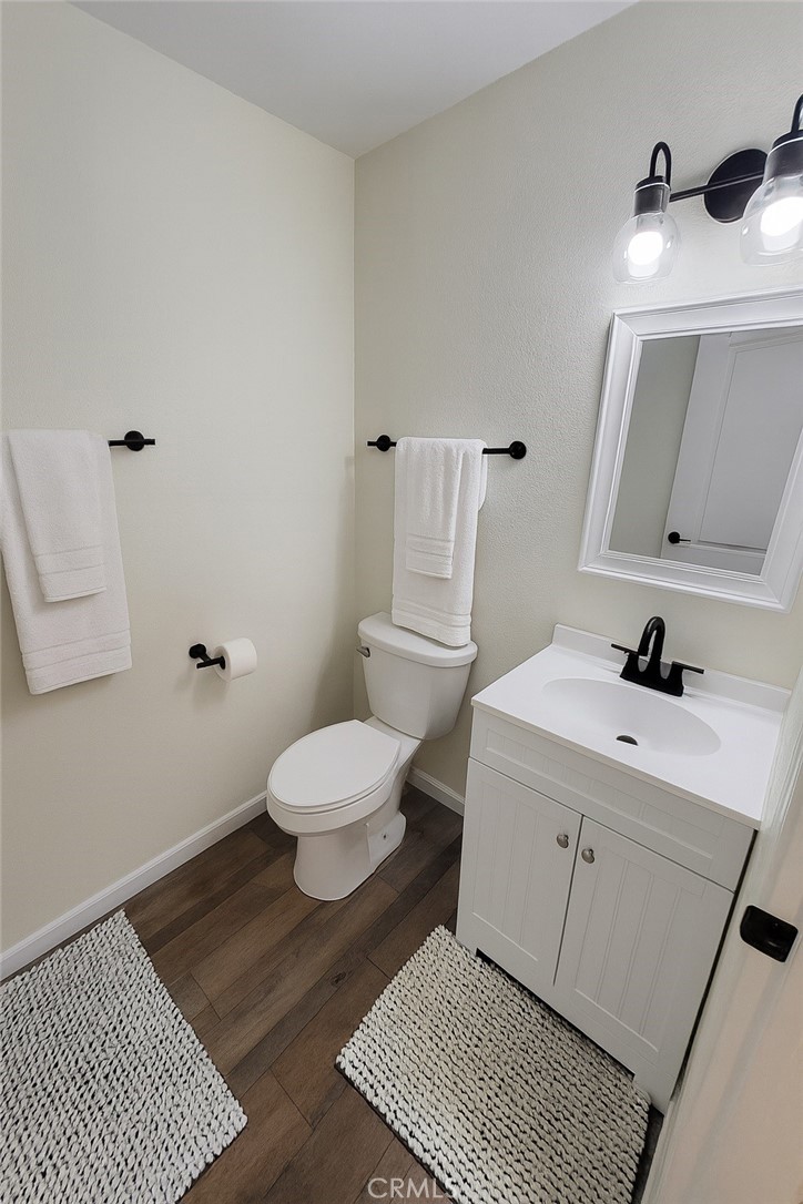 2323 South Cutty Way Anaheim, CA 92802 - Photo 15 of 26 a bathroom with a sink and a toilet