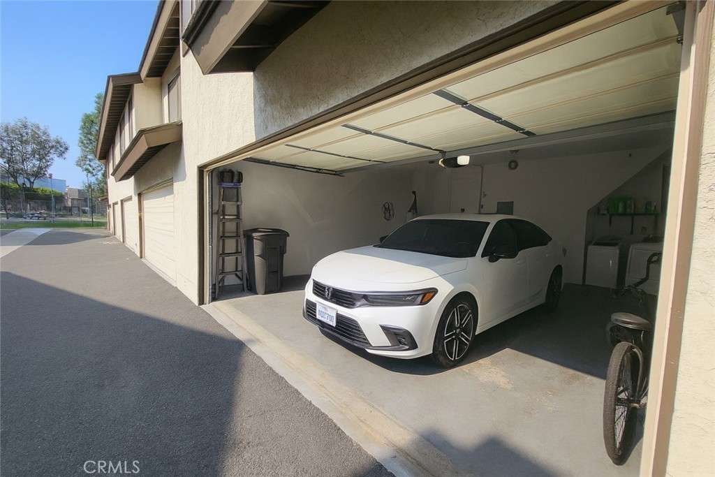 2323 South Cutty Way Anaheim, CA 92802 - Photo 22 of 26 a car parked in garage