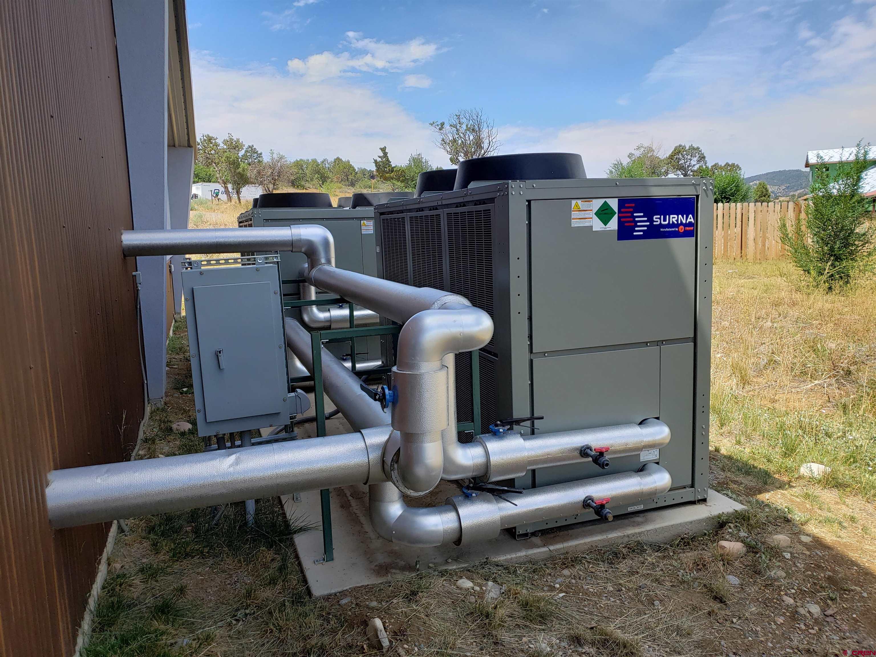 28753 Highway 160 Durango, CO 81301 - Photo 16 of 21 a view of a fireplace with sitting area