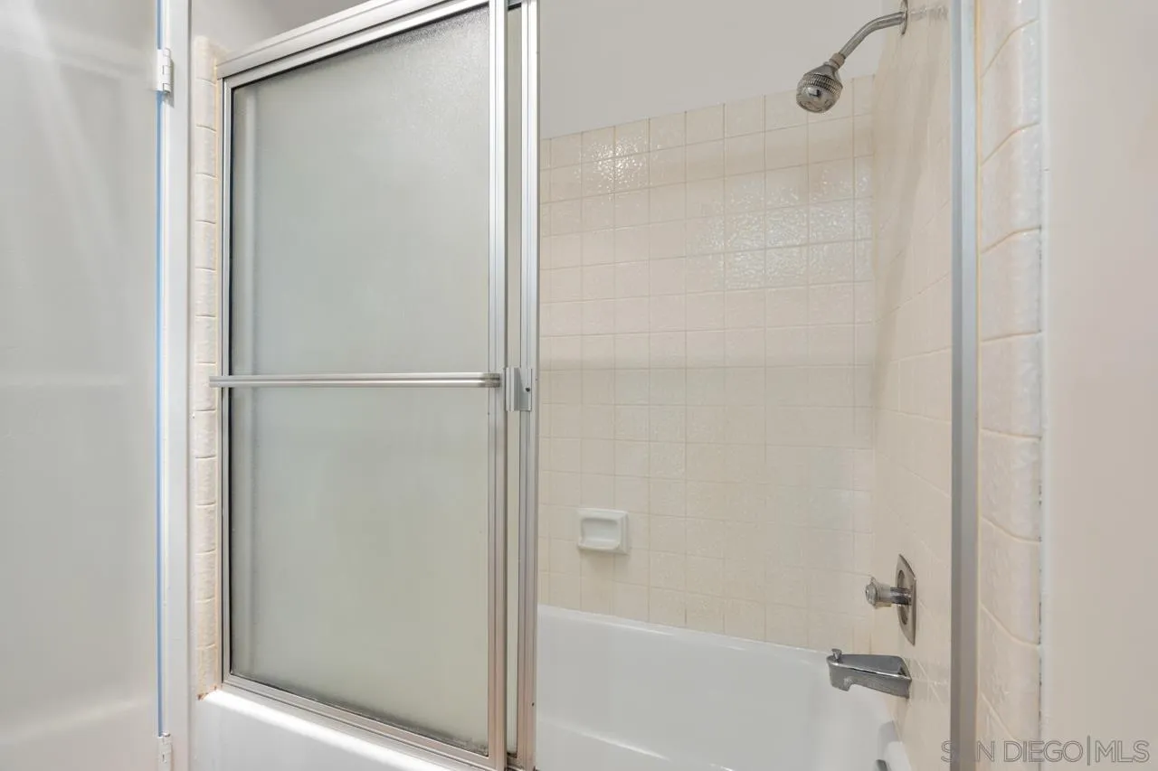 6747 Friars Road, Unit 110 San Diego, CA 92108 - Photo 12 of 24 a bathroom with a bathtub