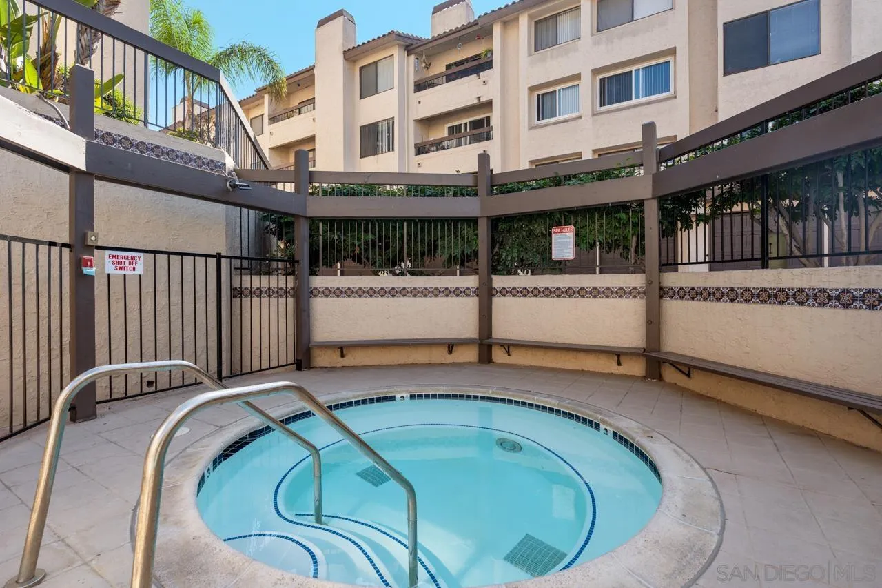 6747 Friars Road, Unit 110 San Diego, CA 92108 - Photo 18 of 24 a view of a patio with a table and chairs