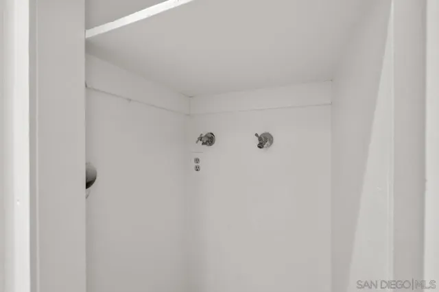 a view of front door and yard