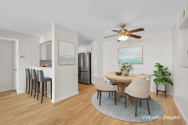 a view of a dining room with furniture and a table