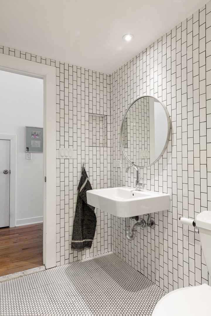 22 North Morgan Street, Unit 215 Chicago, IL 60607 - Photo 16 of 27 a bathroom with a sink toilet and shower