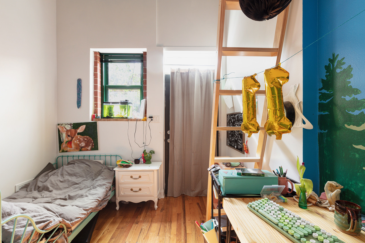 22 North Morgan Street, Unit 215 Chicago, IL 60607 - Photo 18 of 27 a bedroom with a bed and wooden floor