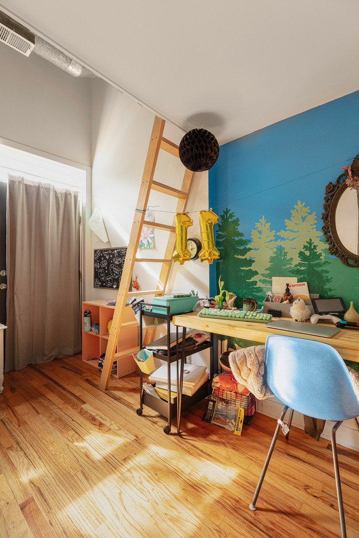 22 North Morgan Street, Unit 215 Chicago, IL 60607 - Photo 20 of 27 a view of a workspace with furniture and chandelier